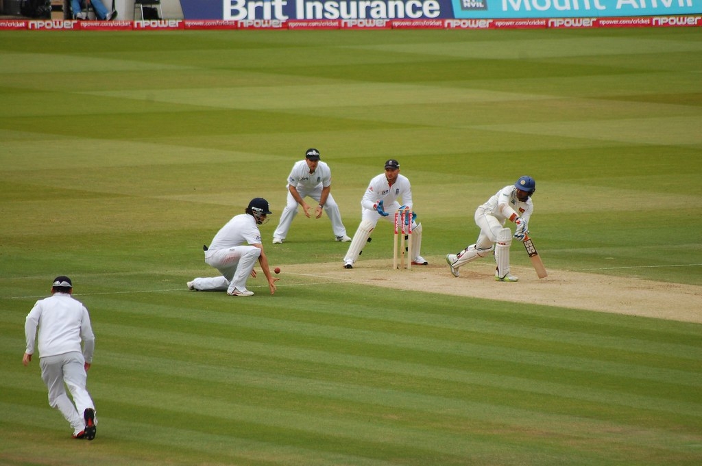 Teams playing cricket