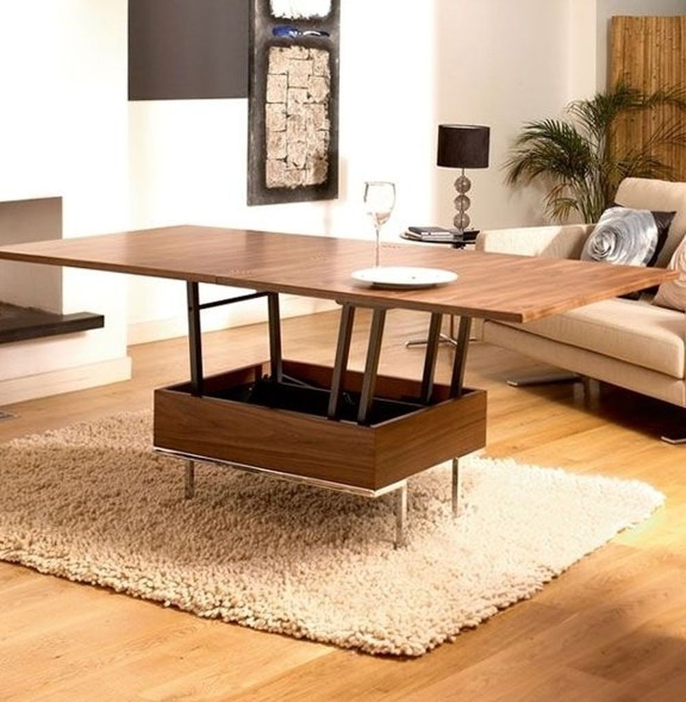 Coffee table which converts deals to a dining table