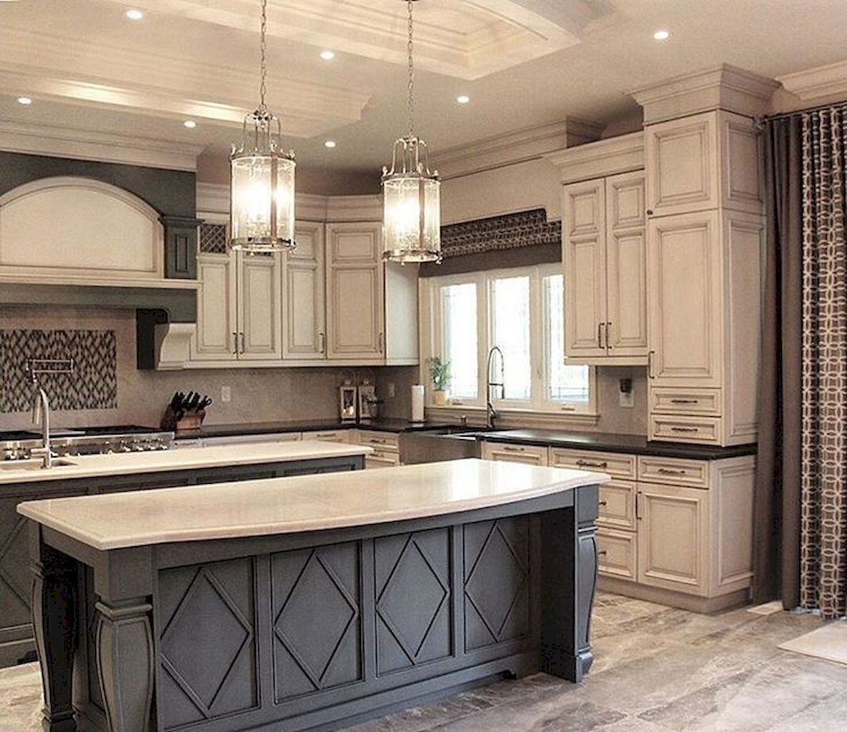 Antique white cabinets with black outlet countertops