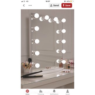 Makeup mirror with light bulbs