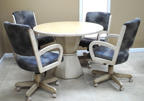 Round dining table with deals caster chairs