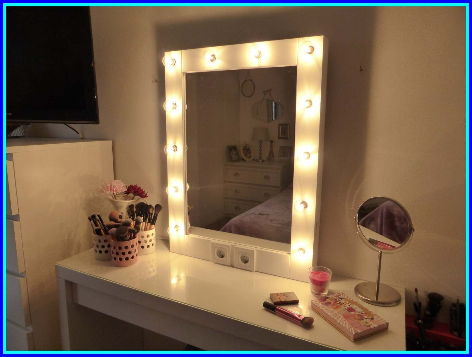 vanity with light bulb mirror