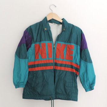 turquoise windbreaker nike