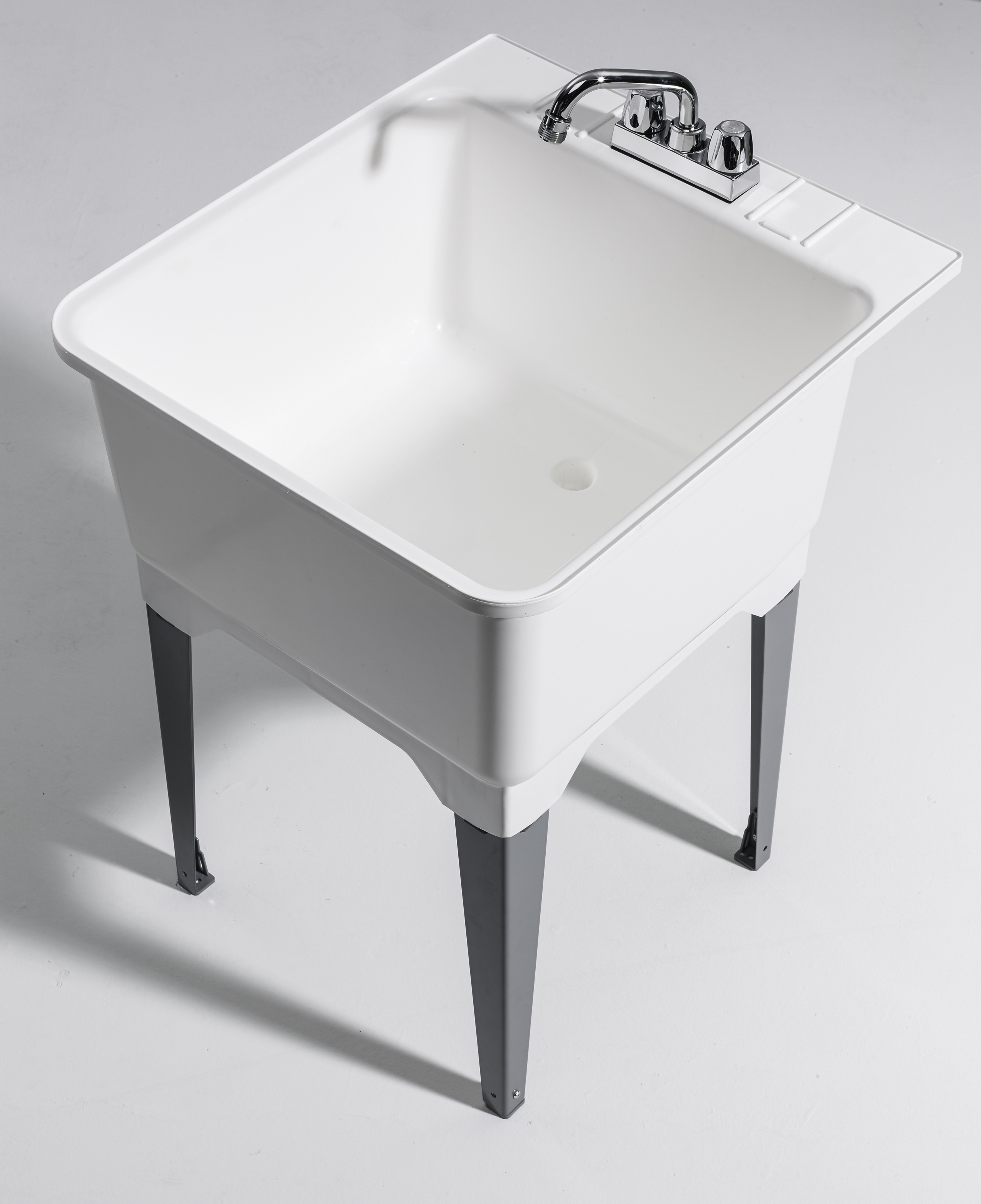 https://visualhunt.com/photos/12/22-75-x-25-25-freestanding-laundry-sink-with-faucet.jpg