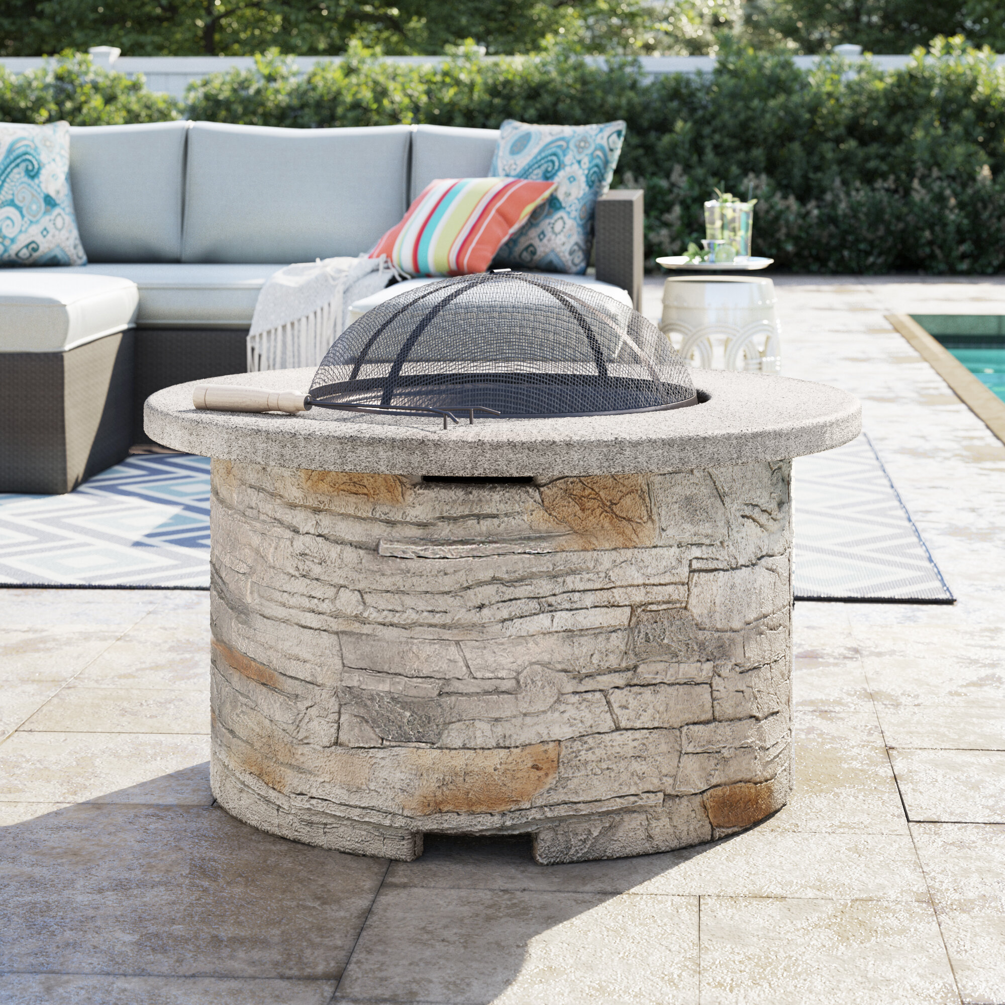 Braselton Faux Stone Wood Burning Fire Pit Table
