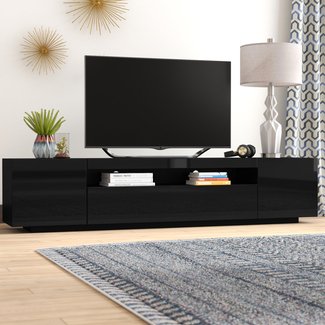 Bustillos Modern High Gloss Front TV Stand for TVs up to 79"