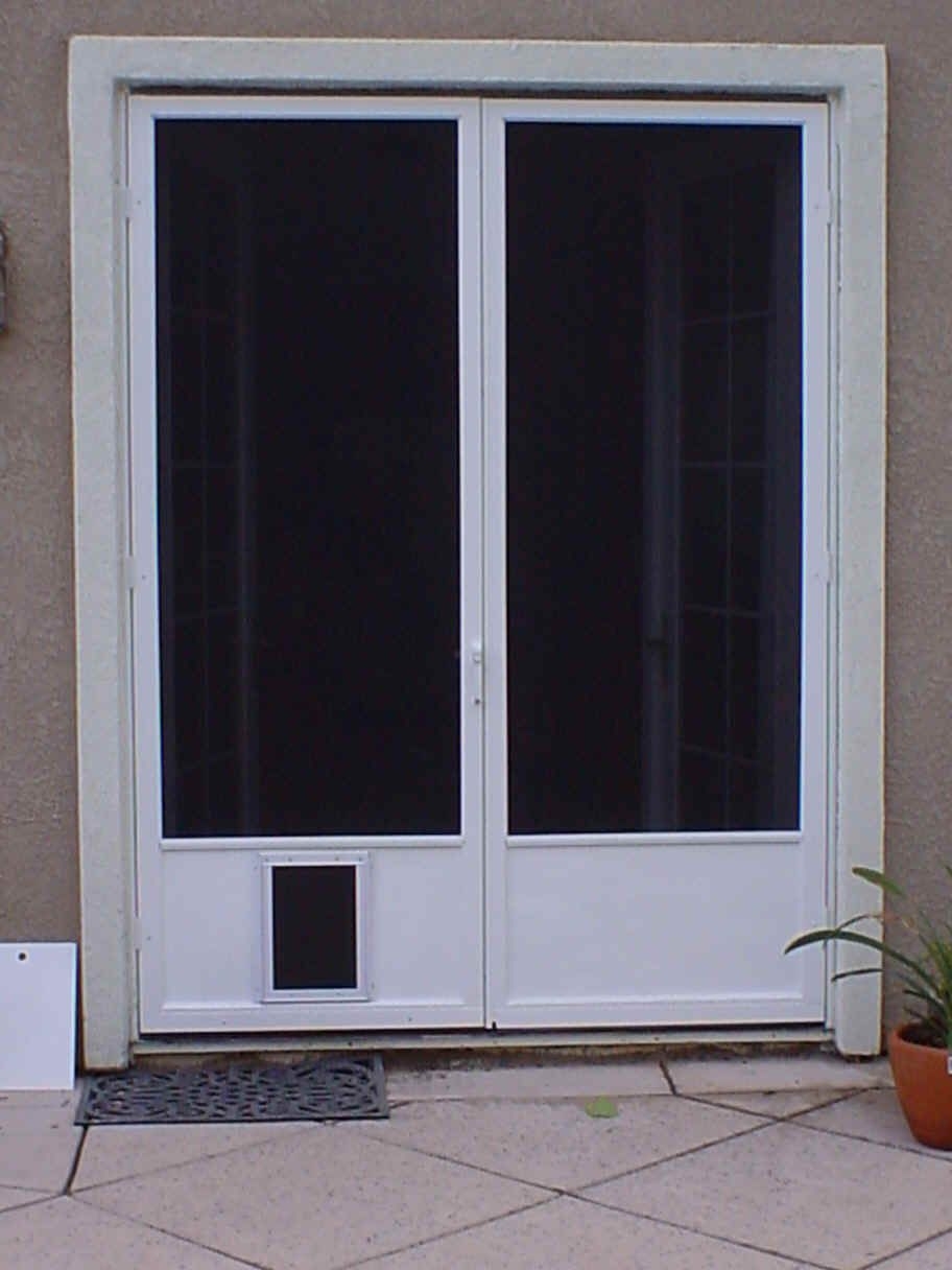 exterior door with window and dog door