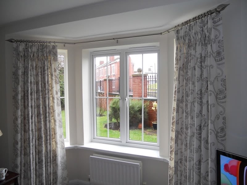 Curtains For Bay Windows Visualhunt, Can You Put Eyelet Curtains On A Bay Window