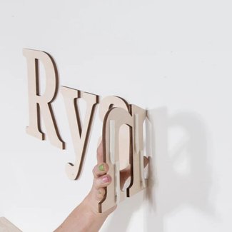 black hanging wall letters