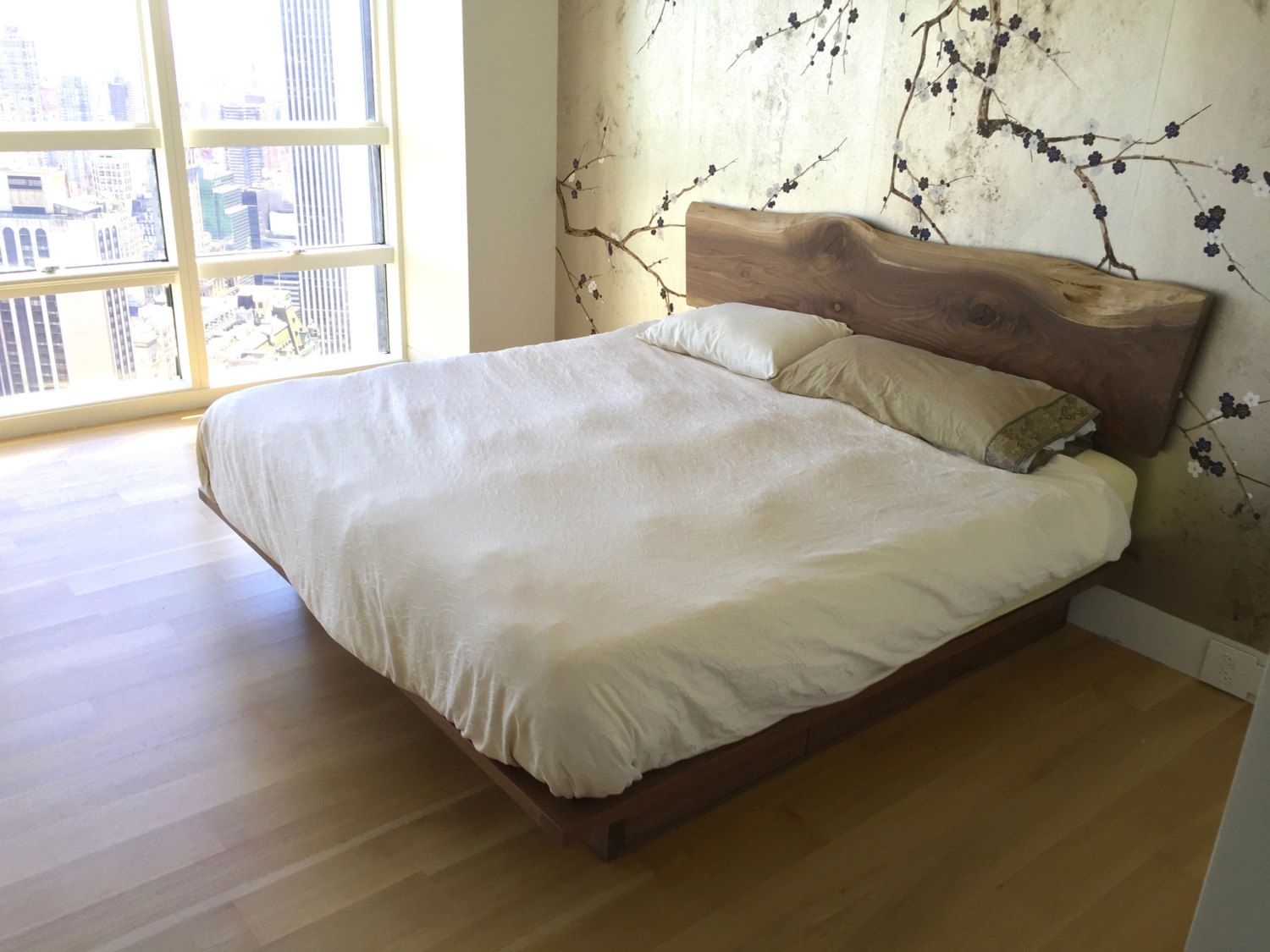Platform storage bed with live edge headboard