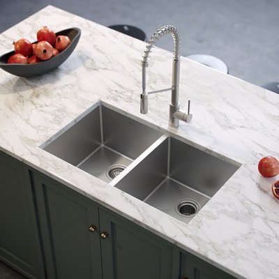 https://visualhunt.com/photos/14/stainless-steel-double-basin-undermount-kitchen-sink-with-drain-assembly.jpeg?s=car