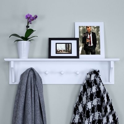 https://visualhunt.com/photos/14/white-solid-manufactured-wood-floating-coat-and-hat-wall-mounted-coat-rack.jpeg?s=car