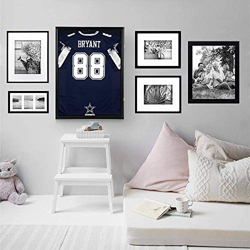 framed jerseys on wall