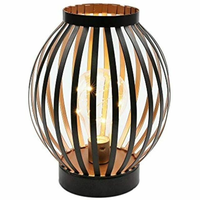 https://visualhunt.com/photos/16/jhy-design-8-7-quot-high-metal-cage-decorative-lamp-battery-powered-cordless-warm-white-light-with-led-edison-style-bulb-great-for-weddings-parties-patio-events-for-indoors-outdoors.jpg