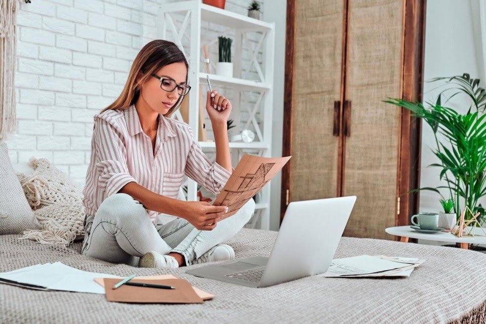 Working On A Laptop In Bed