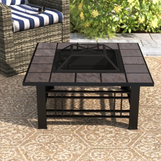 Adreanna 19.5'' H x 32'' W Steel Wood Burning Outdoor Fire Pit Table with Lid