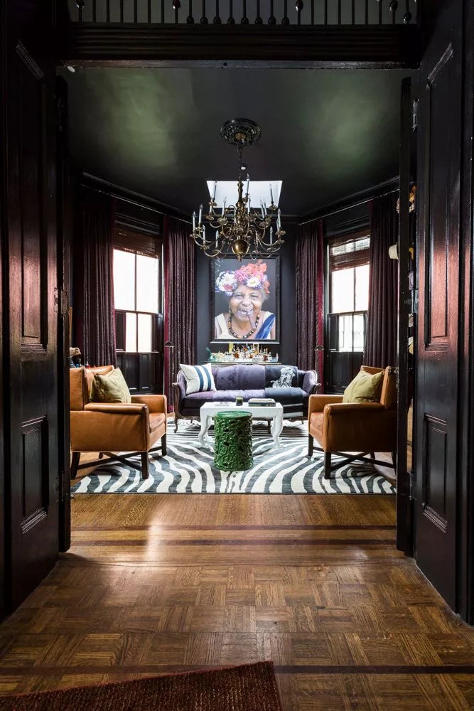 Room with bold black ceiling