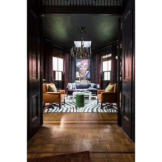 Room with bold black ceiling