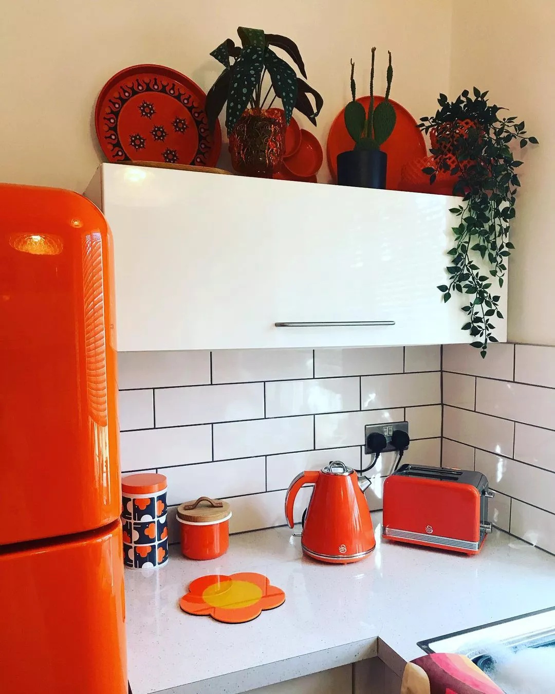 Bold colored appliances in retro kitchen