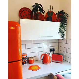 Bold colored appliances in retro kitchen
