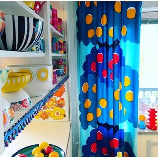 Bold kitchen curtains with artful touch