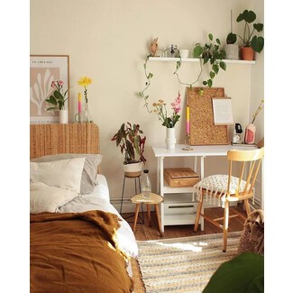 Bright living room with large windows and white furniture