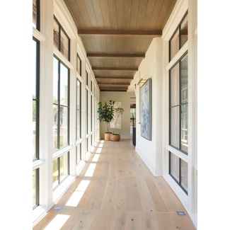 California cool home with beamed ceilings in hallway