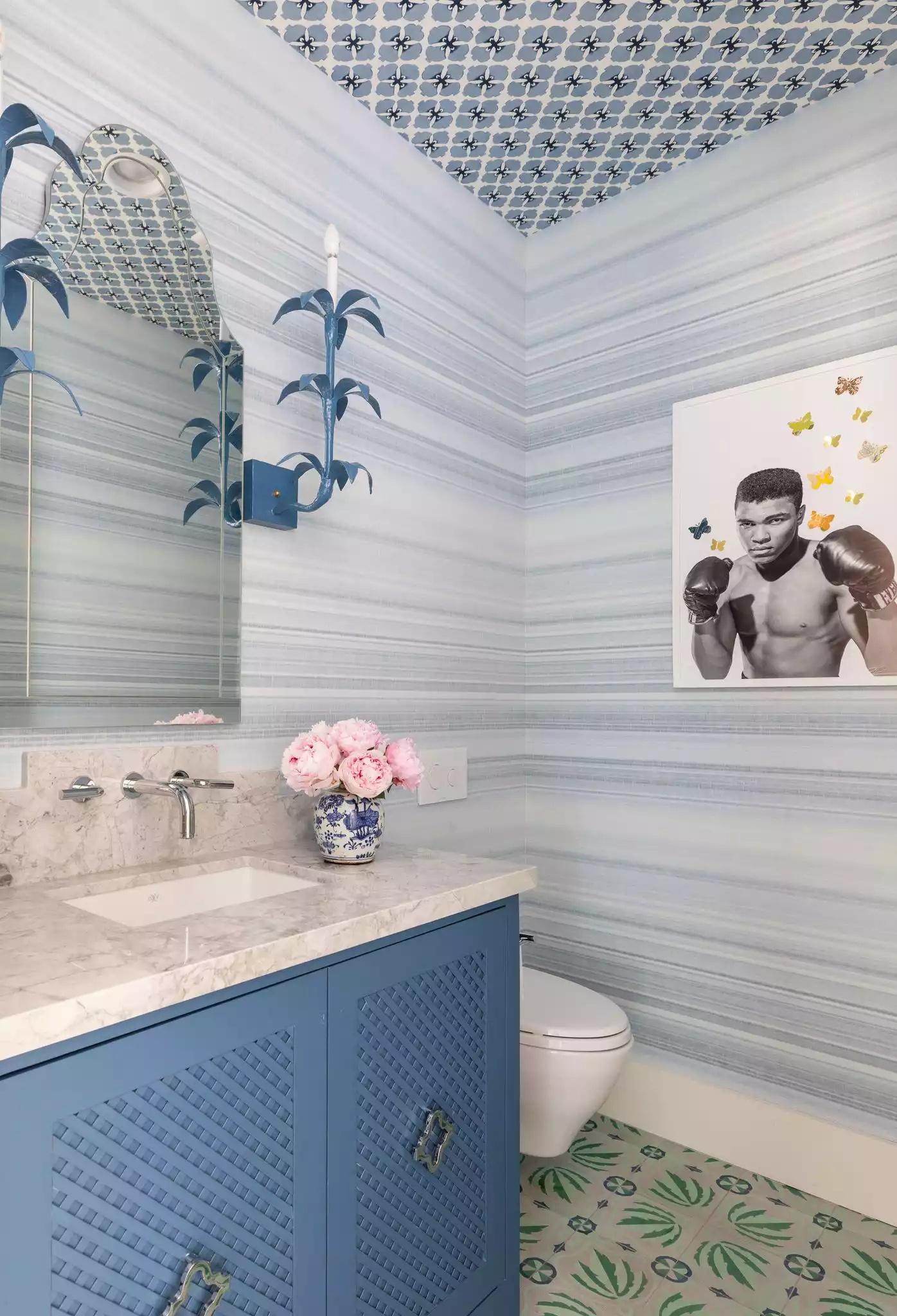 Powder bathroom with mixed patterns on ceiling and floor