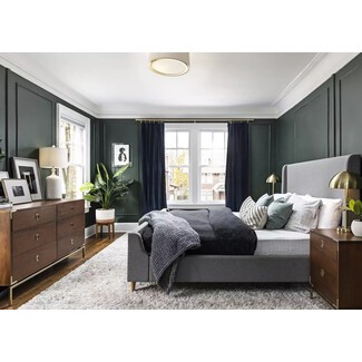 Chic bedroom with canopy bed and soft lighting