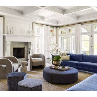 Sunlit living room with classic white tray ceiling