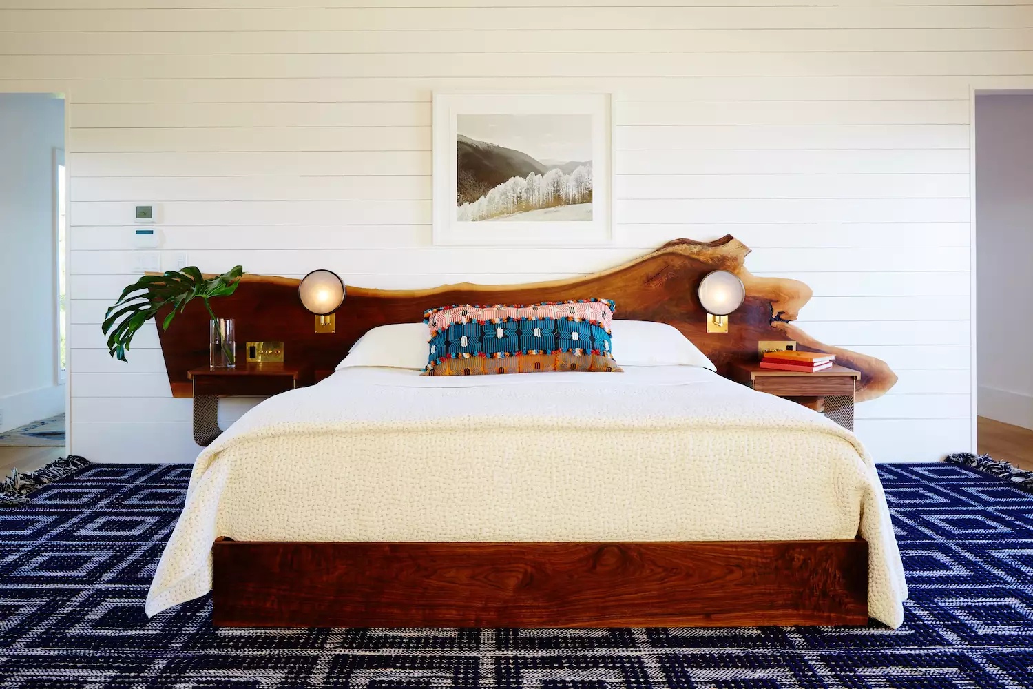 Coastal master bedroom with neutral tones and ocean view