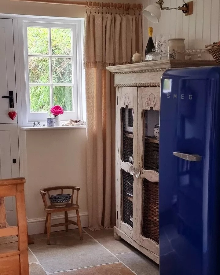 Colorful retro fridge in a bright kitchen