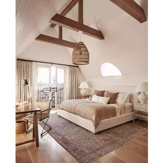 Contemporary bedroom with modern artwork and clean lines