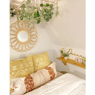 Cozy bedroom with canopy bed and fairy lights