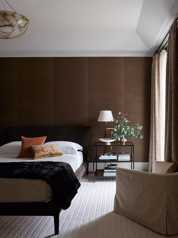 Cozy bedroom with neutral tones and wooden furniture