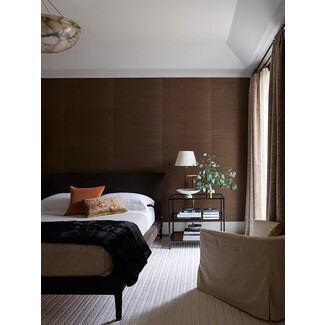 Cozy bedroom with neutral tones and wooden furniture