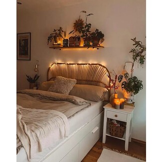 Cozy bedroom with white bedding and string lights