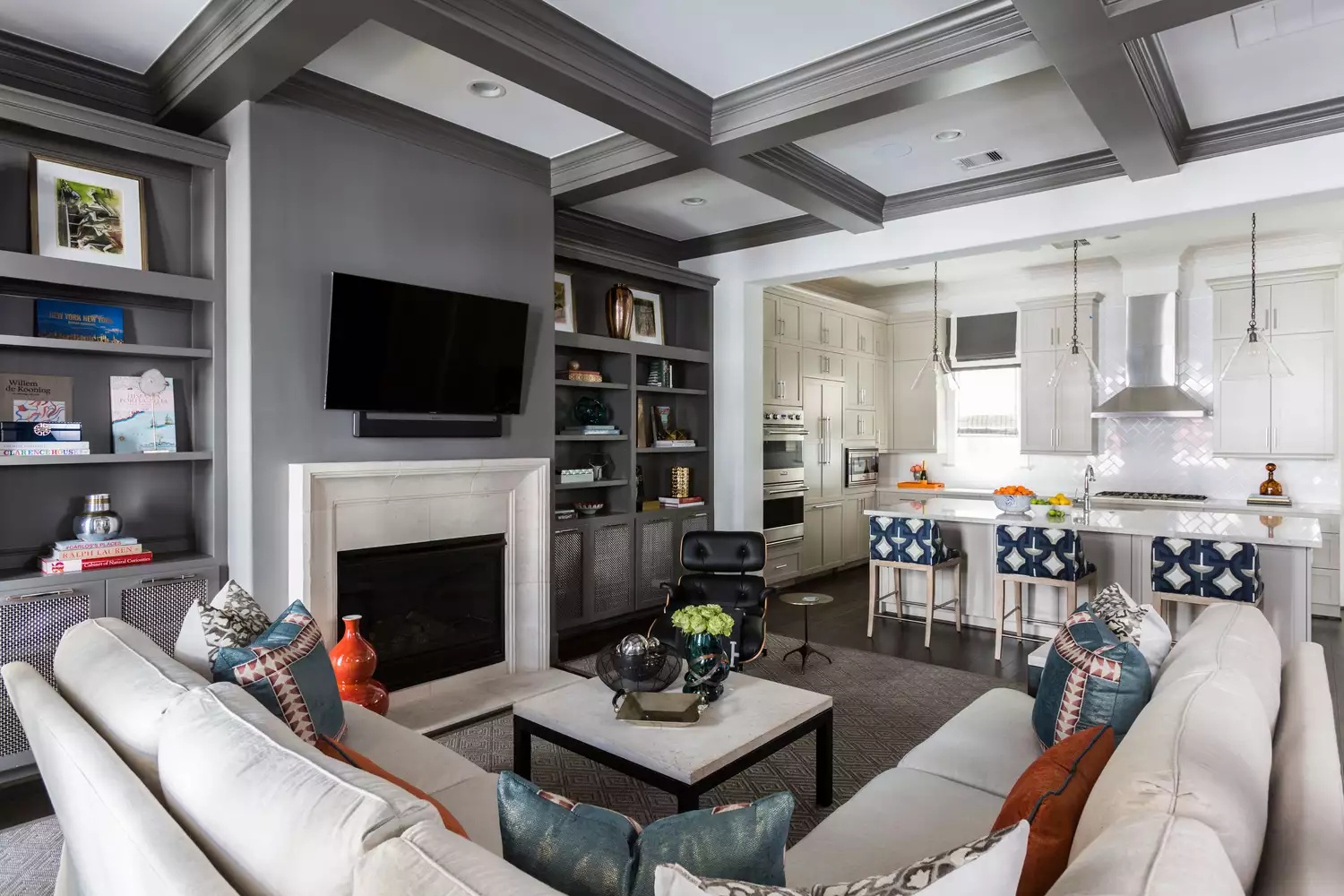 Family gathering space with cozy gray tray ceiling