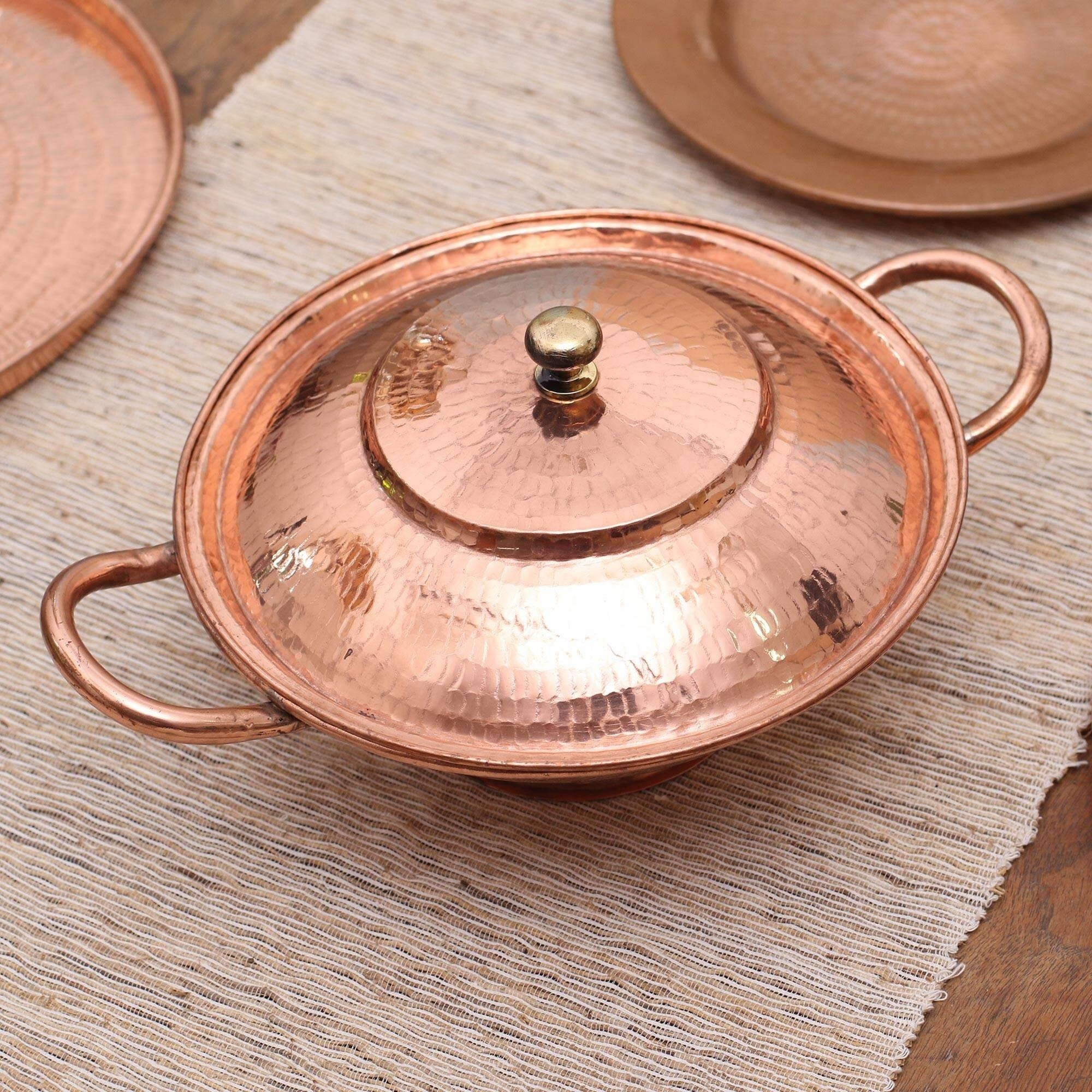 https://visualhunt.com/photos/23/dakota-fields-adonis-copper-serving-bowl.jpg