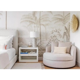 Elegant bedroom with statement chandelier and fireplace