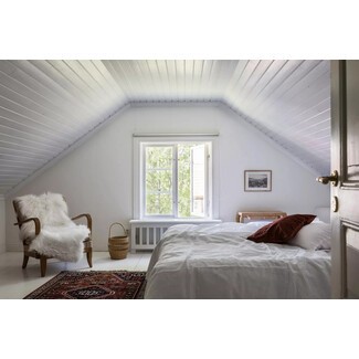 Elegant Mediterranean-style bedroom with canopy bed