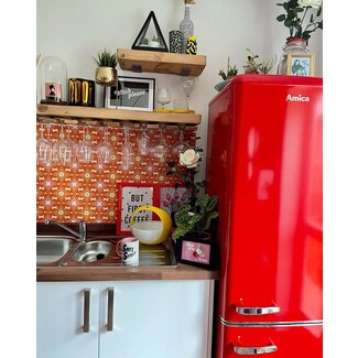 Geometric backsplash in retro kitchen