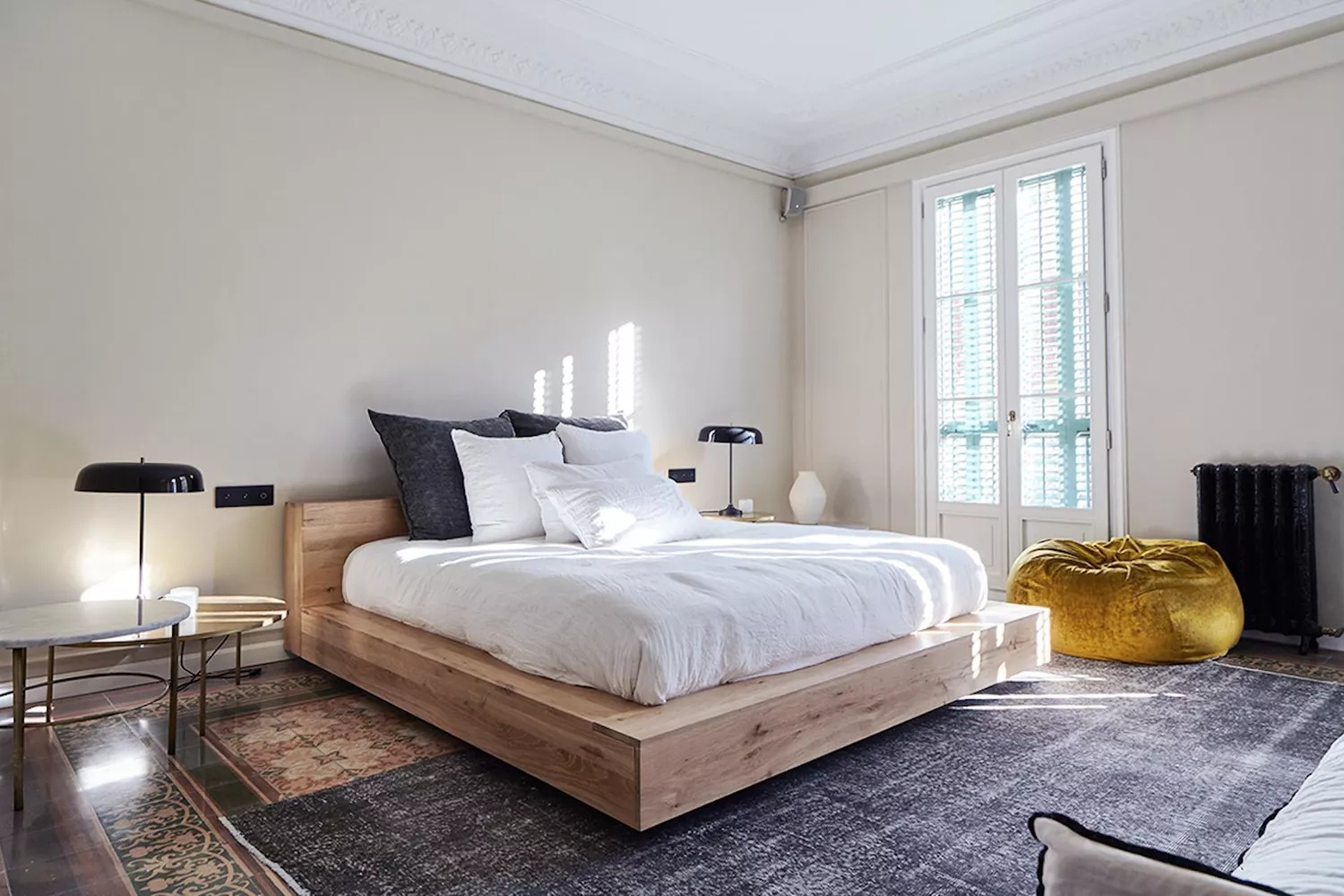 Girona bedroom with unique artwork and contemporary design