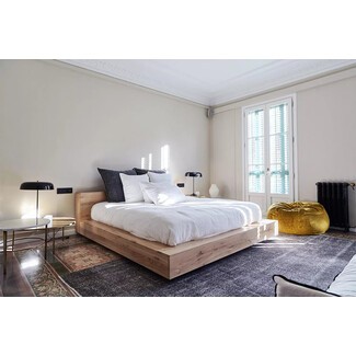 Girona bedroom with unique artwork and contemporary design