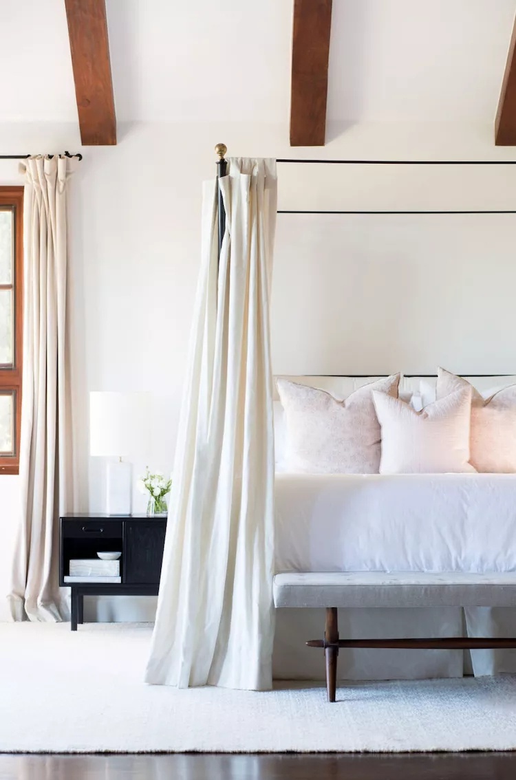 Lush bedroom with greenery and organic textures