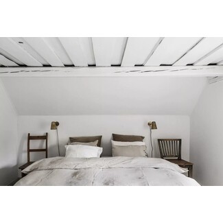 Luxurious bedroom with opulent furnishings and decor