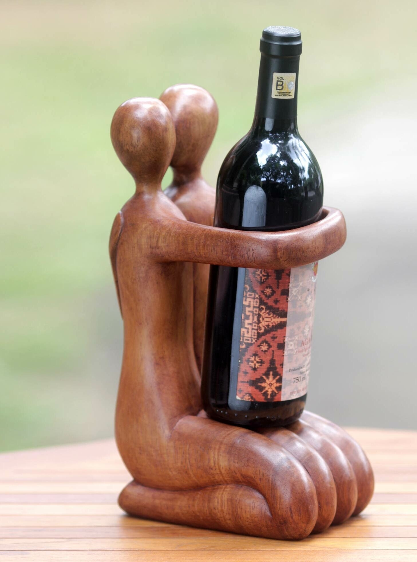 Manal Solid Wood Tabletop Wine Bottle Rack in Brown