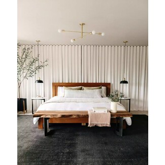 Mid-century modern bedroom with floor-to-ceiling windows