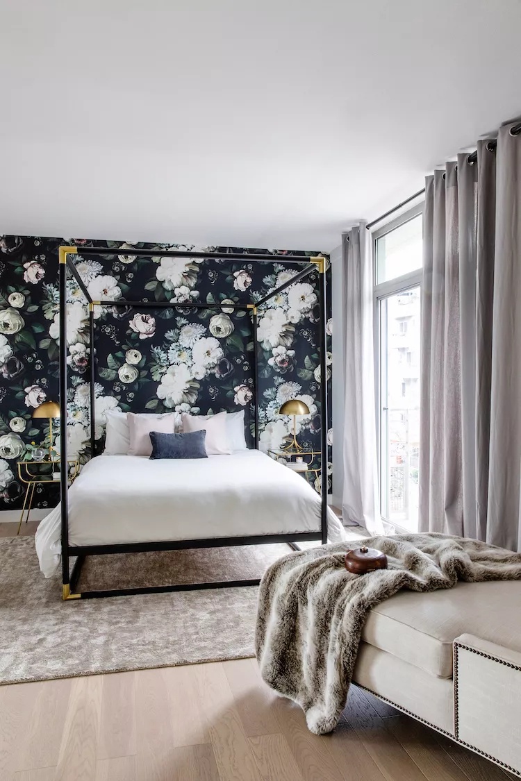 Minimalist bedroom with floor-to-ceiling windows and modern furniture