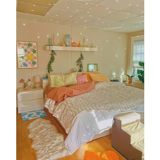 Modern bathroom with floating vanity and round mirror